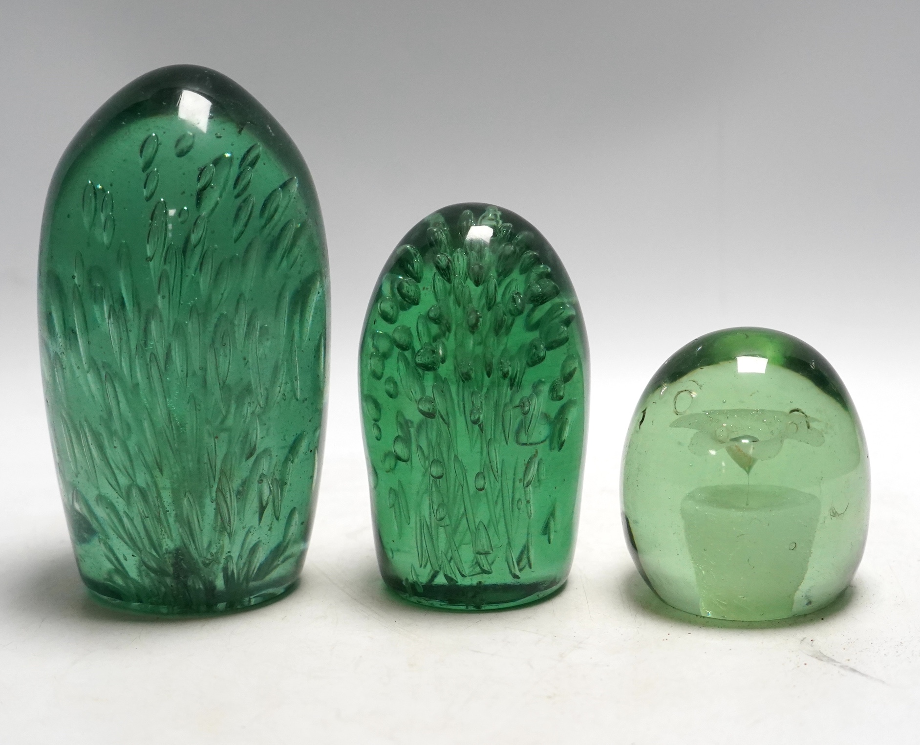 Three Victorian glass dumps, tallest 18cm